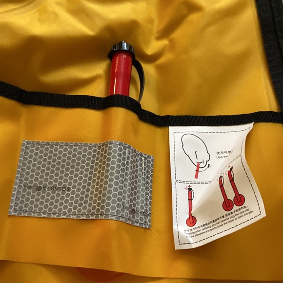 Life jacket. Never worn. New with tags. Manual inflatable jacket - Picture 12 of 13